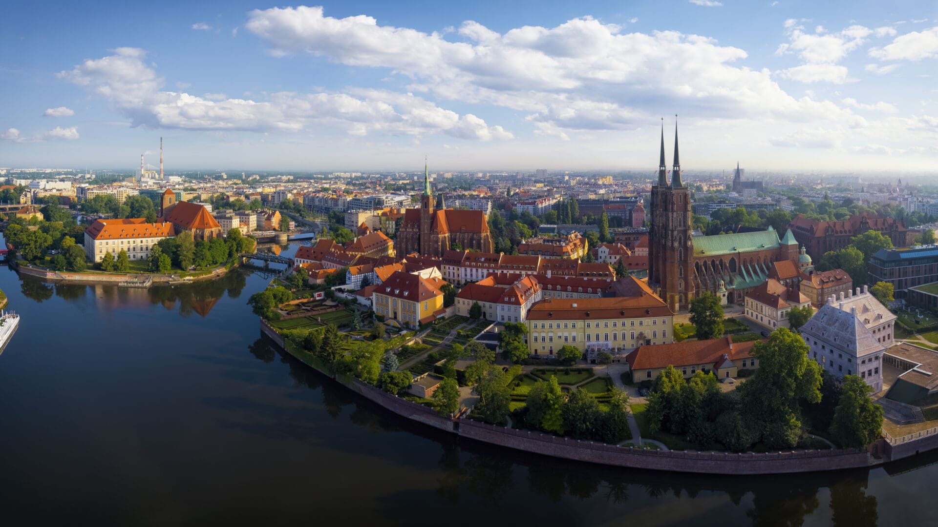 Holidays in Poland - historic town of Wrocław on the Oder River. Morning view of the Ostrow Tumski Island with  gothic the Cathedral of St. John the Baptist